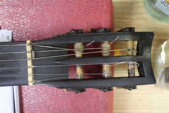 An antique guitar, label for J. Turner